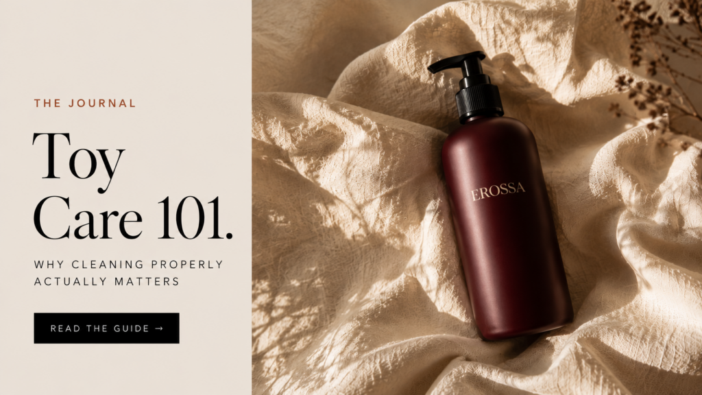 Editorial banner for the EROSSA guide to cleaning intimate products, showing a burgundy cleaner bottle on cream linen